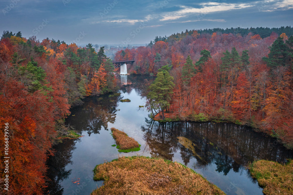 Autumnal landscape of the forest and twisted Radunia river in Kashubia. Poland Autumnal landscape of the forest and twisted Radunia river in Kashubia. Poland