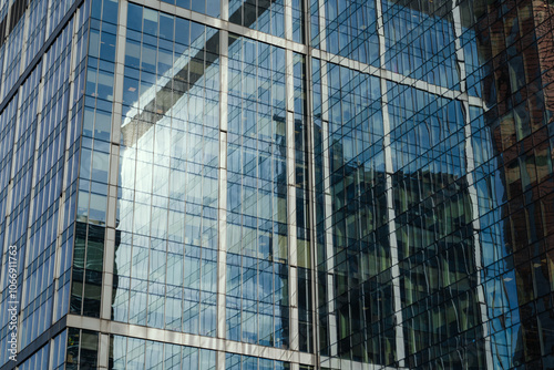 The Reflection of Modern Architecture Seen in a Beautiful Glass Facade of a Building
