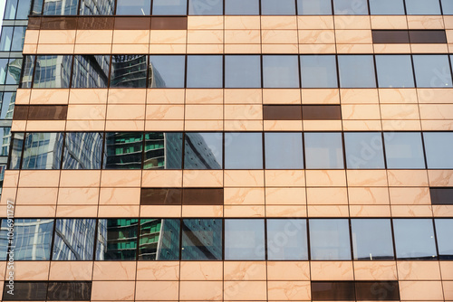 Obraz na płótnie The Reflection of Modern Architecture Seen in a Beautiful Glass Facade of a Building w salonie