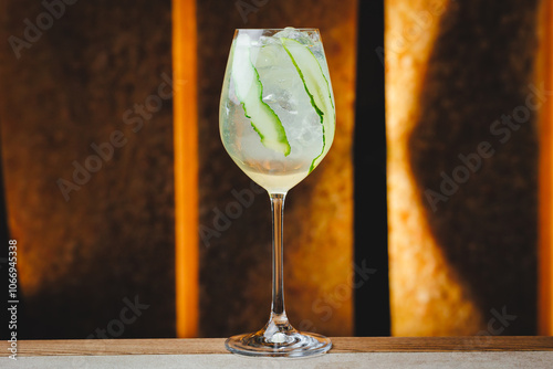 Gin garden cocktail on a light warm background. Bar, party, day off, holiday.