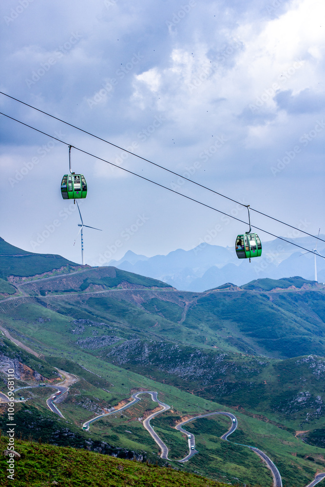 a cable car that is going up a hill a cable car that is going up a hill