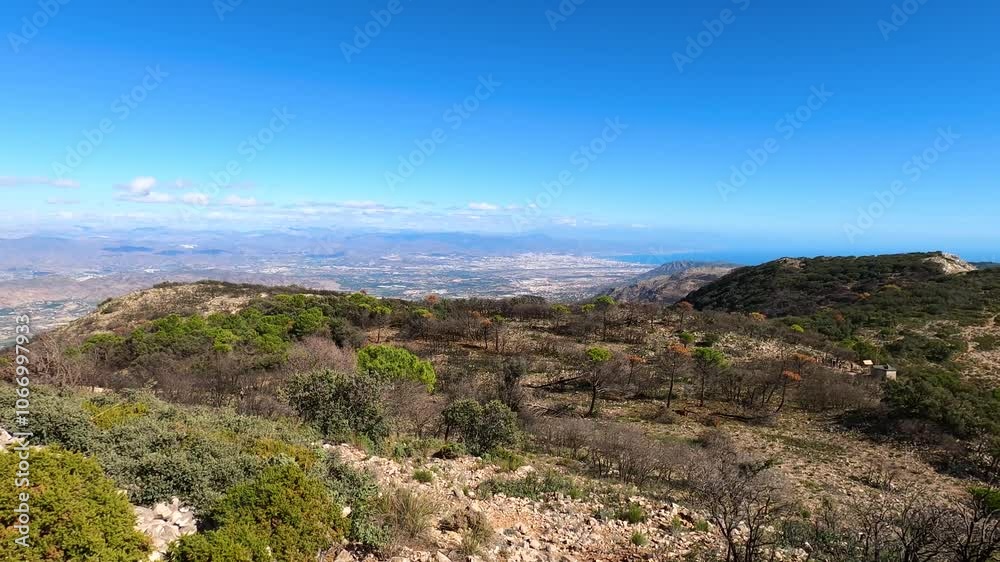 Panoramic view on Mediterranean sea and surrounding cities from Mijas peak, Andalusia, Malaga, Spain Panoramic view on Mediterranean sea and surrounding cities from Mijas peak, Andalusia, Malaga, Spain