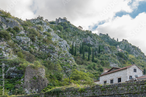 Walls of the Kotor Fortress with mountains and blue sky, Montenegro