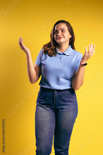 Portrait of a Brazilian woman, wearing a polo shirt and jeans