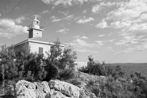 Lighthouse in Croatia. Black and white retro style photo.