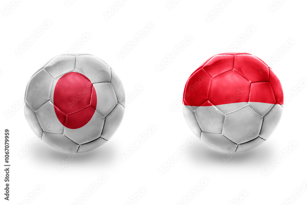 football balls with national flags of indonesia and japan ,soccer teams. on the white background. football balls with national flags of indonesia and japan ,soccer teams. on the white background.