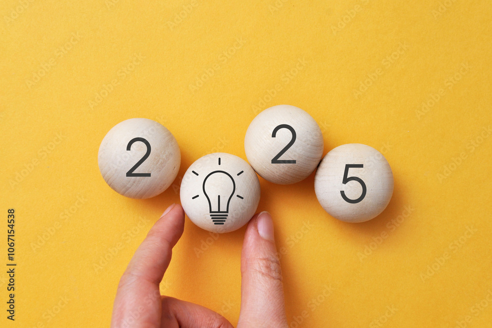 The inscription 2025 and the light bulb turned on in it. The new year is coming soon, and with it a lot of new creative ideas The inscription 2025 and the light bulb turned on in it. The new year is coming soon, and with it a lot of new creative ideas