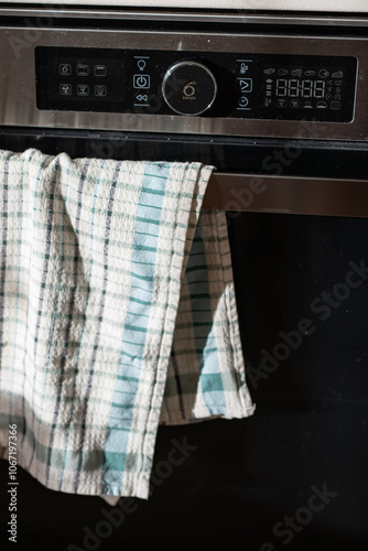 Dial on a smart oven with a towel.
