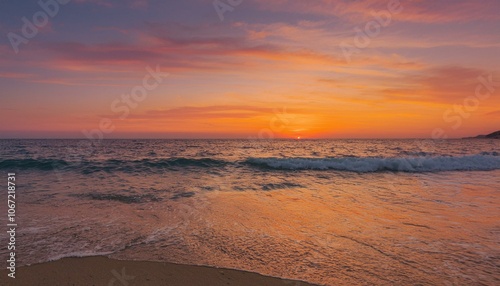 Waves on the beach at red sunset