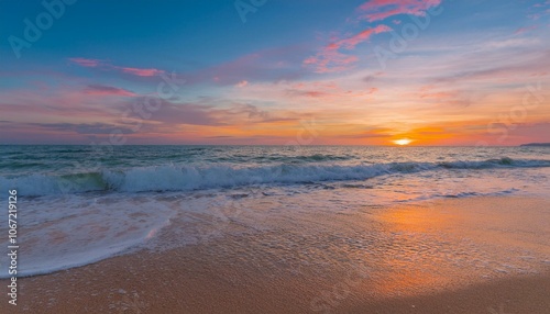 Waves on the beach at red sunset