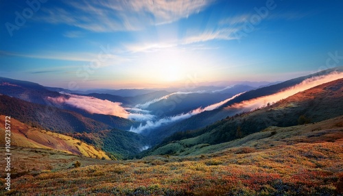 Waves of light in the mountain valley stretch into the sky