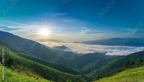 Waves of light in the mountain valley stretch into the sky