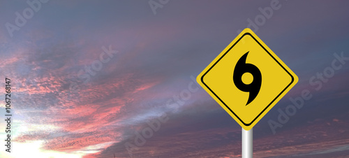 danger,caution,Hurricane Idalia warning sign against a powerful stormy background with copy space. Dirty and angled sign with cyclonic winds add to the drama.hurricane season sign on cloudy background photo