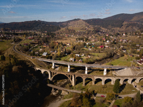 stone bridge in the mountains photo