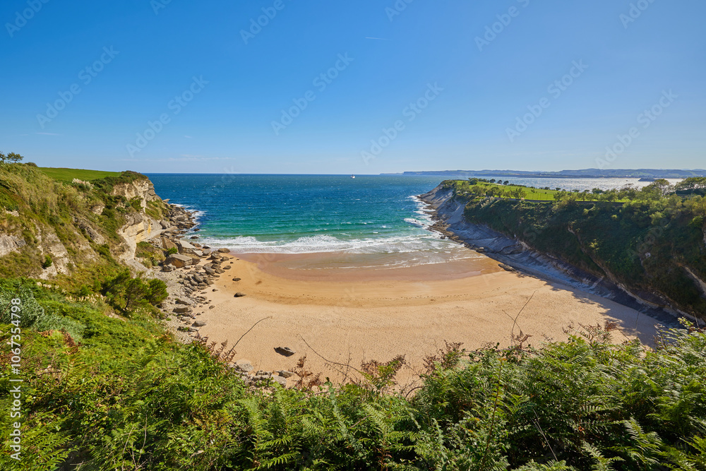Sunny day on a Matalenas Beach in Santader, Spain Sunny day on a Matalenas Beach in Santader, Spain