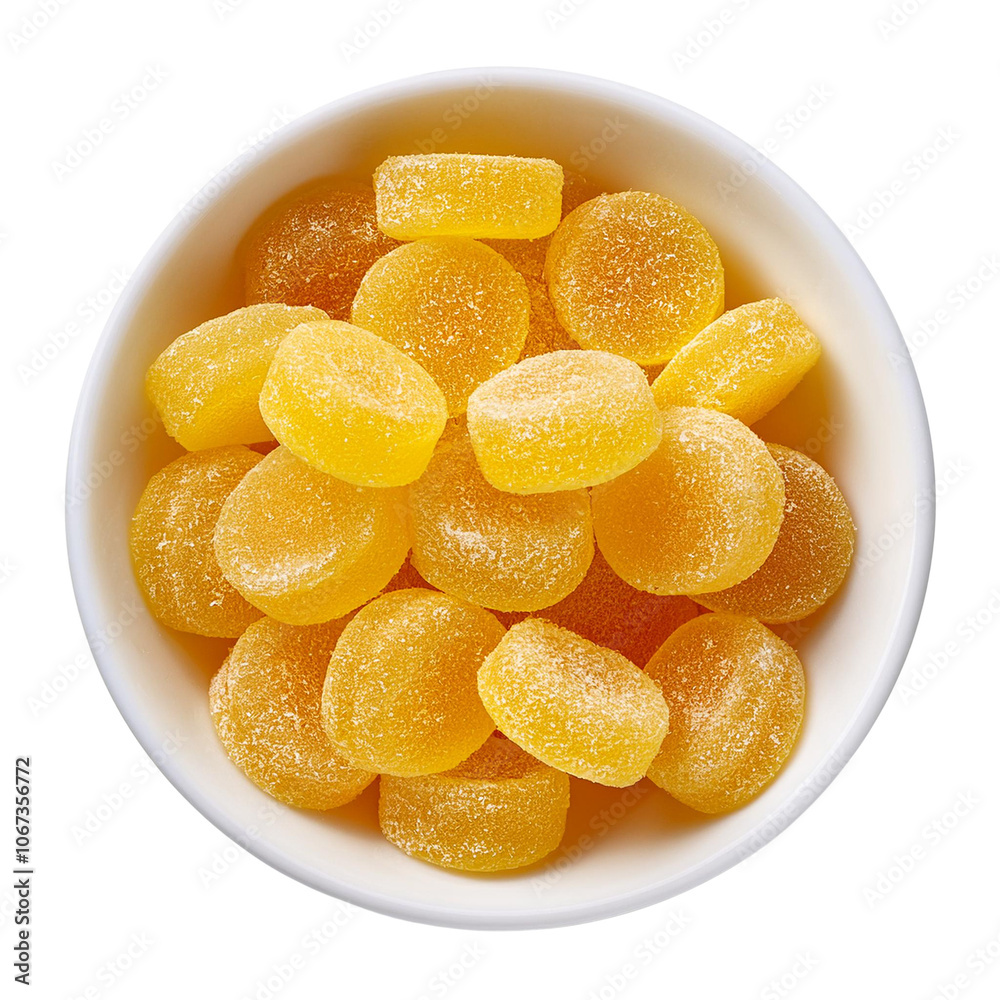 Yellow gummy candies in a white bowl. transparent Yellow gummy candies in a white bowl. transparent