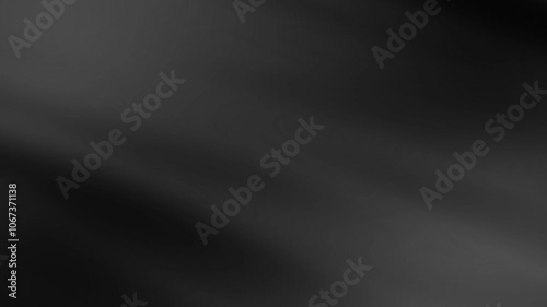 Dark textured black fabric with slight metallic accents in the background, animation of fabric.