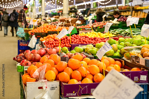 Photography fresh oranges at Holesovice Market, Holesovicka trznice in Prague, lively market