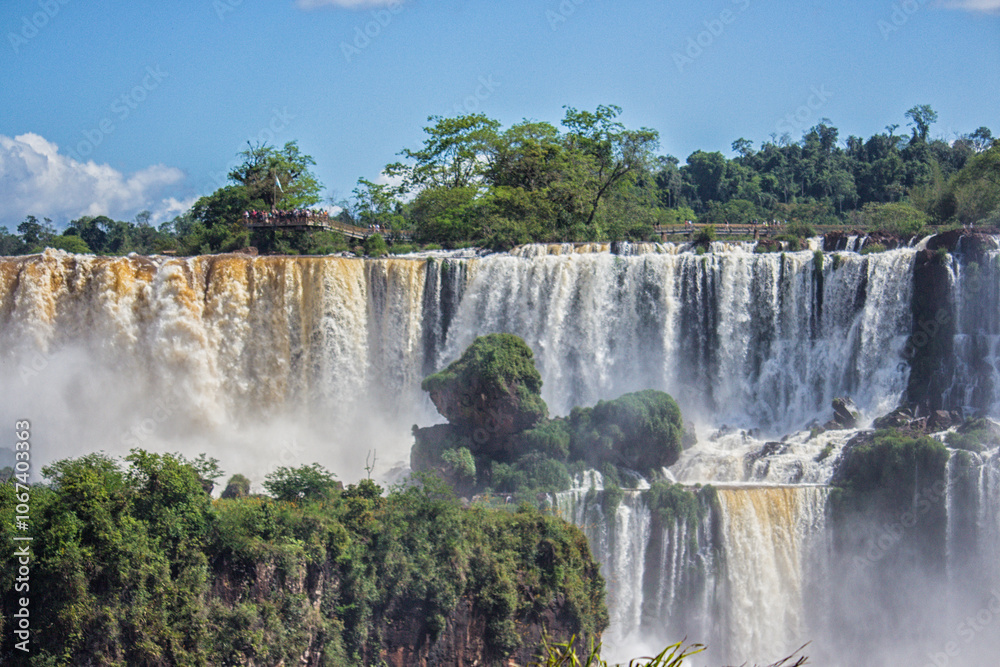 Fototapeta premium Panoramic view of Iguazu Falls on a sunny day, Misiones, Argentina