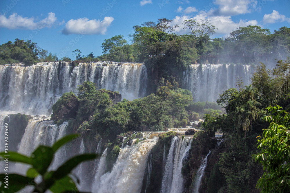 Fototapeta premium Panoramic view of Iguazu Falls on a sunny day, Misiones, Argentina