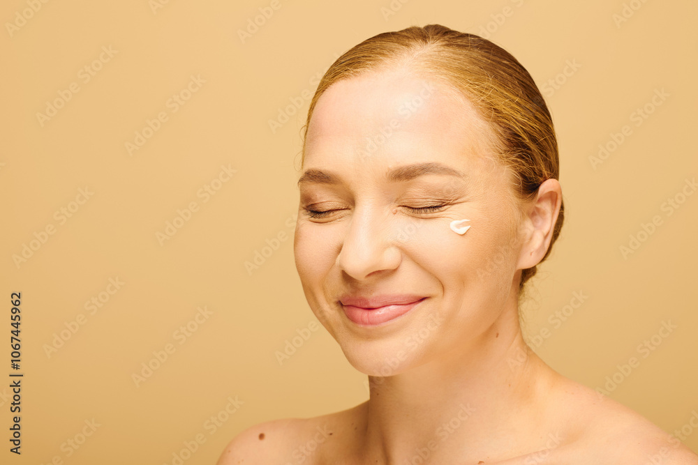 A young plus size woman smiles with cream on her face, radiating happiness. A young plus size woman smiles with cream on her face, radiating happiness.