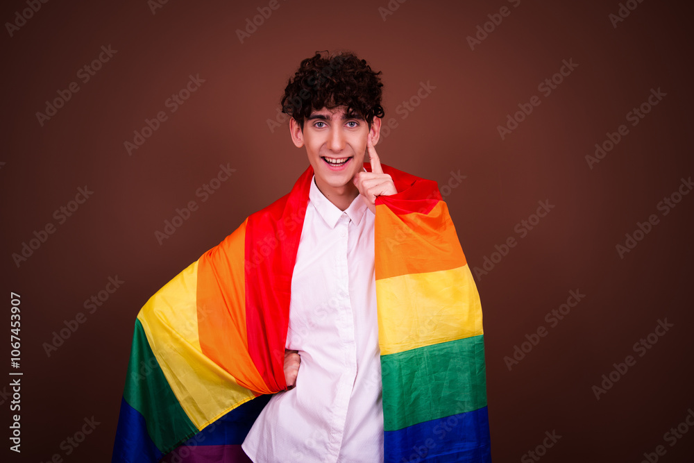 Young attractive man and gay flag. Young attractive man and gay flag.