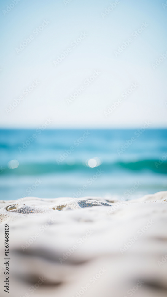 white sand beach with a blue ocean horizon