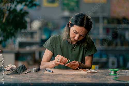 Canvas Print in a large green workshop on a woman with green hair creates decorative flowers