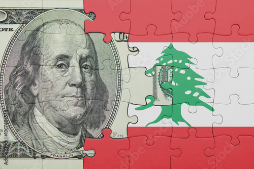 Wallpaper Mural puzzle with the national flag of lebanon and the usa dollar money .finance concept Torontodigital.ca