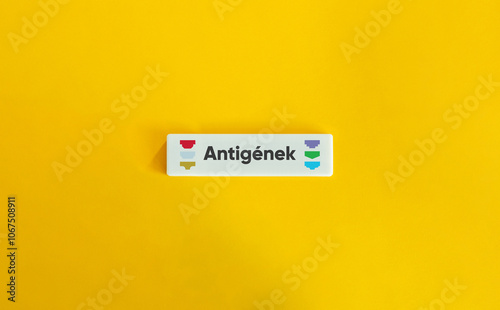 Antigens Concept Image. Icon and Text on Block Letter Tile on Yellow Background.