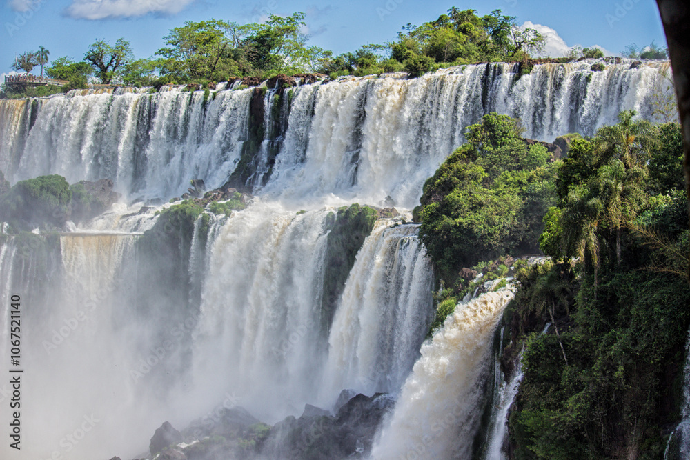 Waterfalls at Iguazu Falls on a sunny day, Misiones, Argentina Waterfalls at Iguazu Falls on a sunny day, Misiones, Argentina