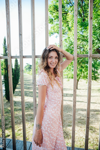 Free Download Beautiful woman smiling in summer dress in park walking - GFXLoad