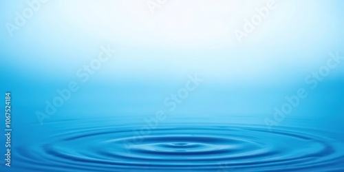 A serene blue water drop background with a subtle gradient effect, evoking feelings of calmness and tranquility, wet, waterdrop, h2o photo