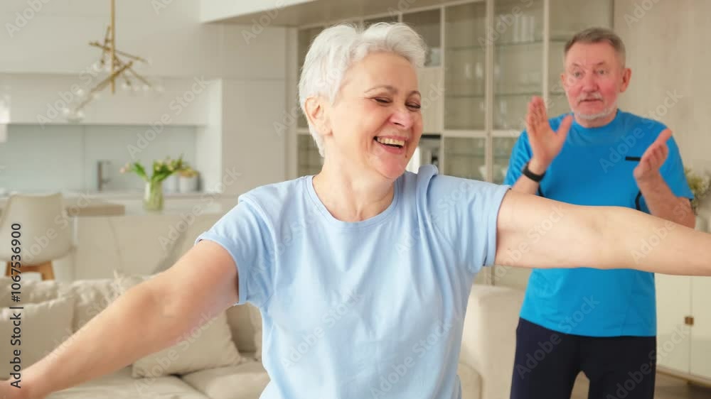 Fitness workout training. Senior woman picking up dumbbells. Old adult mature healthy lady doing sports exercise at home. Grandmother have workout rehabilitation. Health care healthy lifestyle Fitness workout training. Senior woman picking up dumbbells. Old adult mature healthy lady doing sports exercise at home. Grandmother have workout rehabilitation. Health care healthy lifestyle