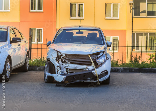 broken car after an accident in the courtyard