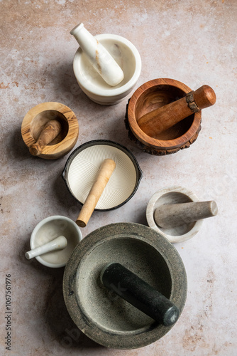 Variety of different kinds of mortar and pestle photo