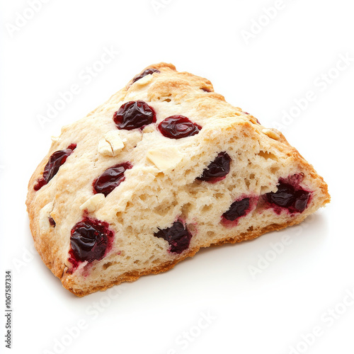 A freshly baked scone with visible cranberries, isolated on a white background, emphasizing a flavorful breakfast pastry