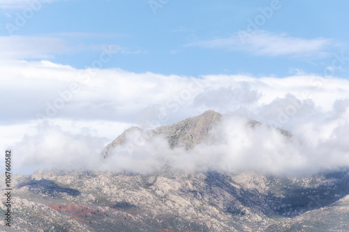 Cumulus Congestus Clouds against blue sky over  montains
