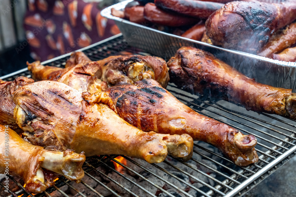 Turkey legs cooking on a grill Turkey legs cooking on a grill