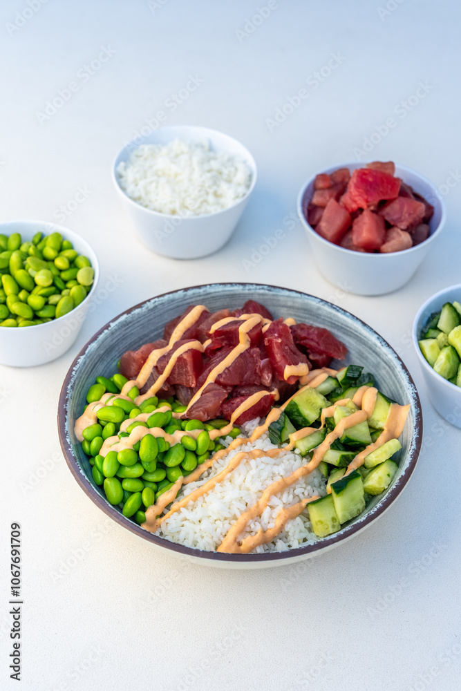 Poke bowl with tuna being made Poke bowl with tuna being made