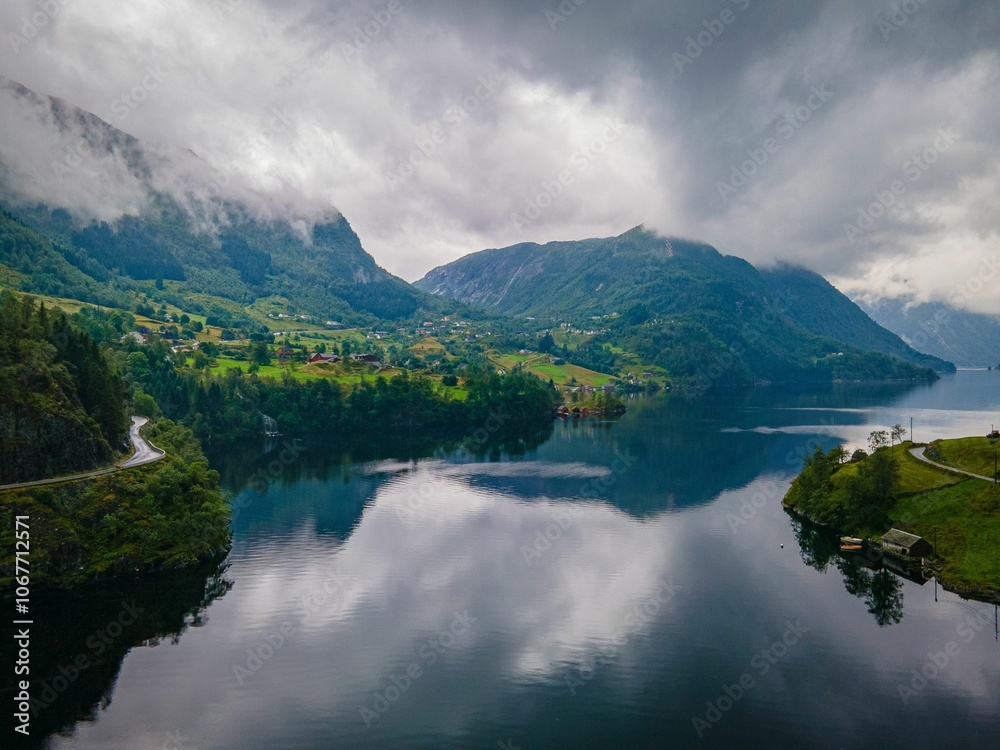Norwegian fjord with lush hills and reflections. Norwegian fjord with lush hills and reflections.