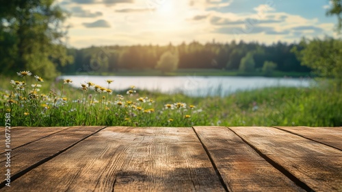 Fototapeta Naklejka Na Ścianę i Meble -  Empty wooden table in the foreground with a blurred background of a tranquil lake and forest