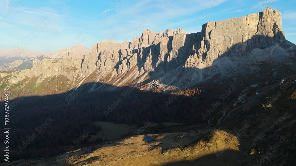 Passo Giau and Ra Gusela mountain in the evening in autumn, Dolomites, Italy, drone video, aerial footage Passo Giau and Ra Gusela mountain in the evening in autumn, Dolomites, Italy, drone video, aerial footage