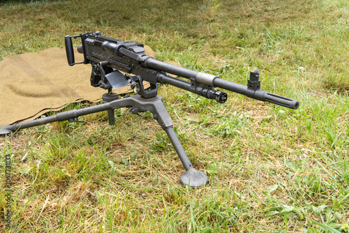 Belgian-made 7.62 mm machine gun on a tripod photo