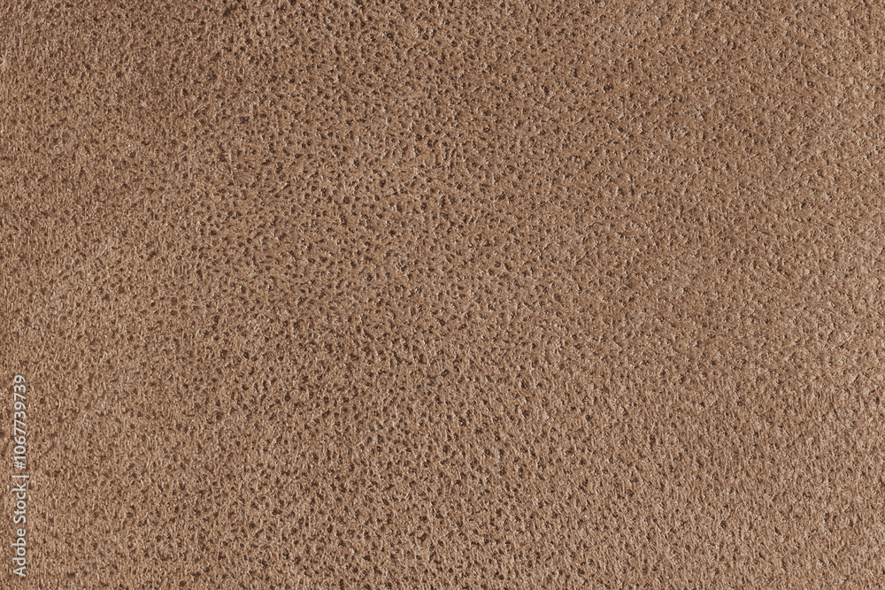 Brown suede leather texture with embossed shabby spotted pattern. Structure of fleecy cloth surface, decorative upholstery fabric, home decor and garment. Wallpaper, background, backdrop. Brown suede leather texture with embossed shabby spotted pattern. Structure of fleecy cloth surface, decorative upholstery fabric, home decor and garment. Wallpaper, background, backdrop.