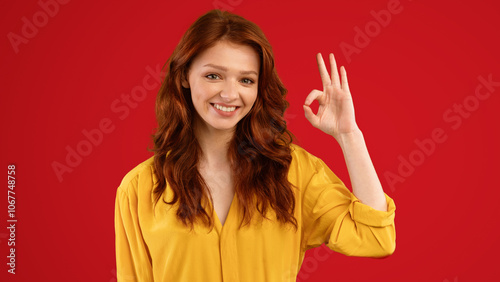 Everything Is OK. Millennial Girl Gesturing Okay Sign Posing Smiling To Camera On Green Studio Background. Panorama