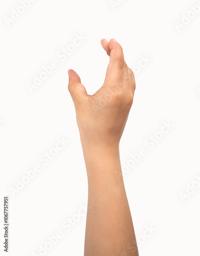 Close-up of child hand holding some like a blank object isolated on a white background photo