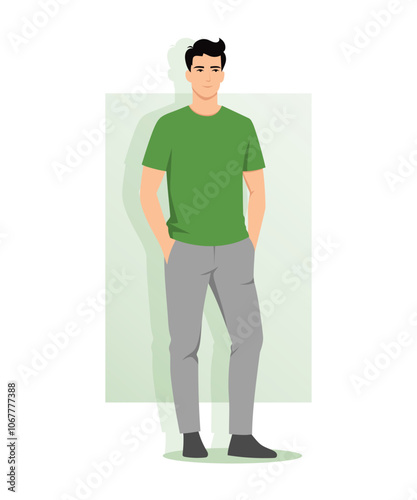 A young man in a green T-shirt and grey trousers. A casual and comfortable look that emphasizes simplicity and practicality, with an emphasis on minimalism.