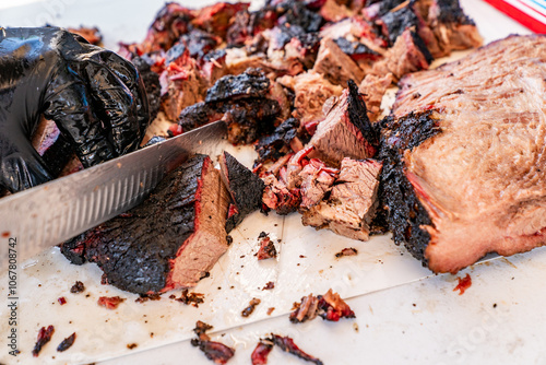 Smoked beef brisket cooked in a smoker and on a grill  photo