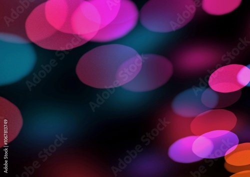 Abstract colorful bokeh lights on black background.